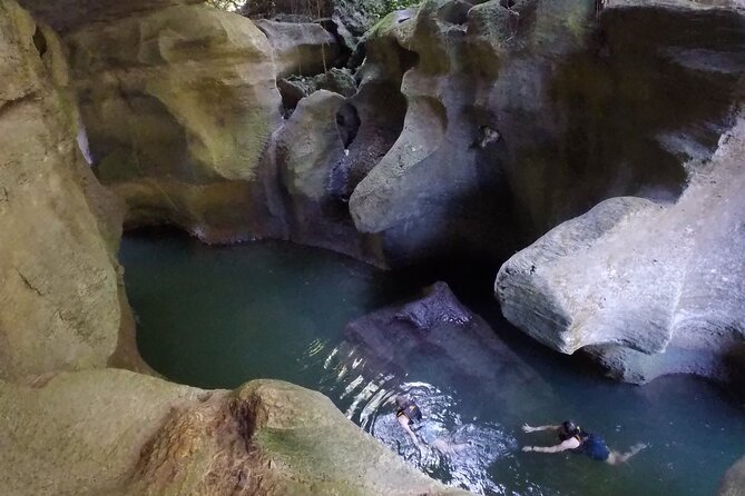 Cave Adventure - Charco Azul Caves, Canyon & Waterfall Adventure - Arenales Caves: freshwater, bats, and quiet darkness