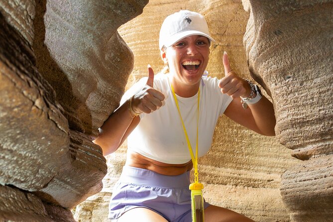 Cueva del Indio and Charco Azul Cave and Waterfall Adventure - Seeing Taino carvings inside the seaside cave