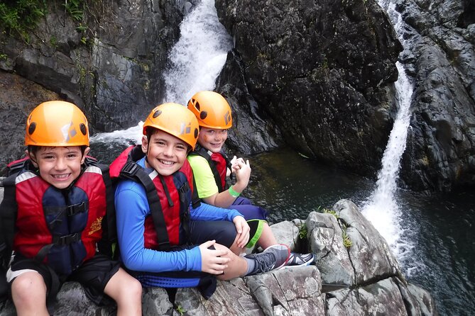 El Yunque Rainforest Tour: Natural Waterslides Adventure - Hiking, climbing, and canyoning through the forest