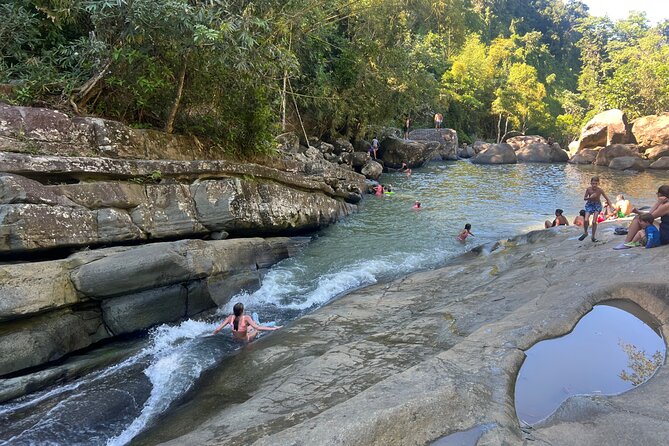 El Yunque Rainforest- Water Slide, Luquillo Beach Guided Tour - Las Pailas, the day’s main thrill