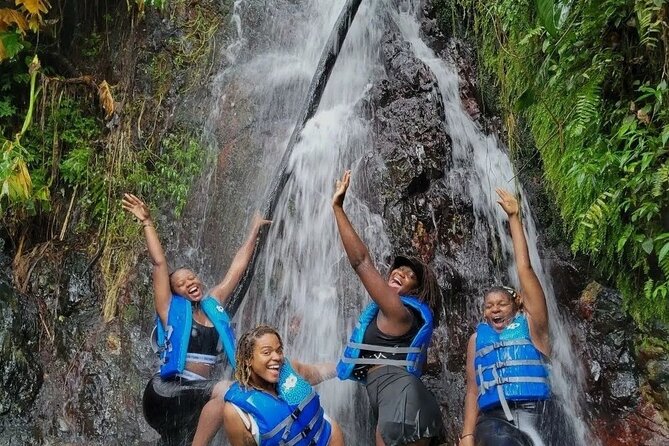 El Yunque Rainforest - Waterslide, Cliff jump, and Rope swing! - A muddy 25-minute hike through El Yunque