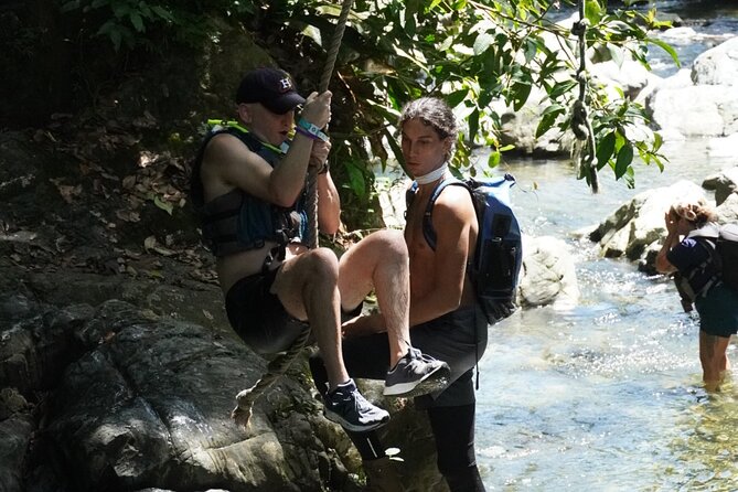Famous Natural Waterslide in El Yunque Rainforest - The rope swing and the fun of getting muddy