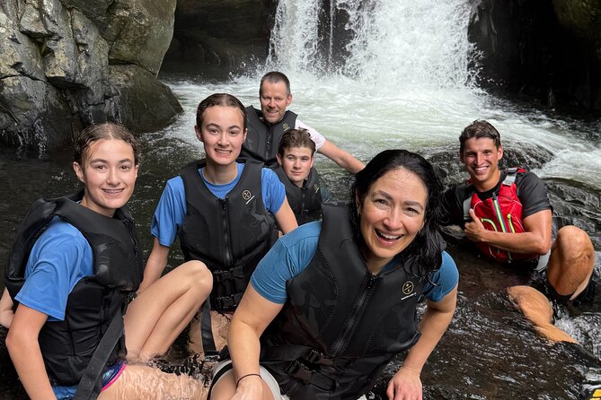 Half Day El Yunque Tour, Waterslide and Rope Swing - Following the guide into El Yunque