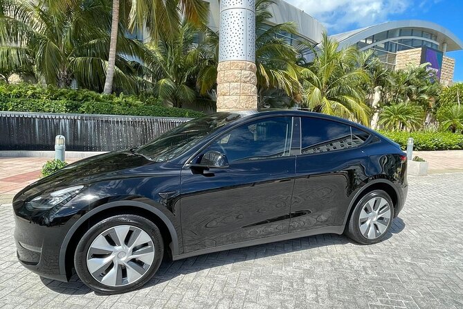 Puerto Rico Island Wide Transfer, Tesla Y Luxury SUV, Select Zone - From airport baggage claim to your final address