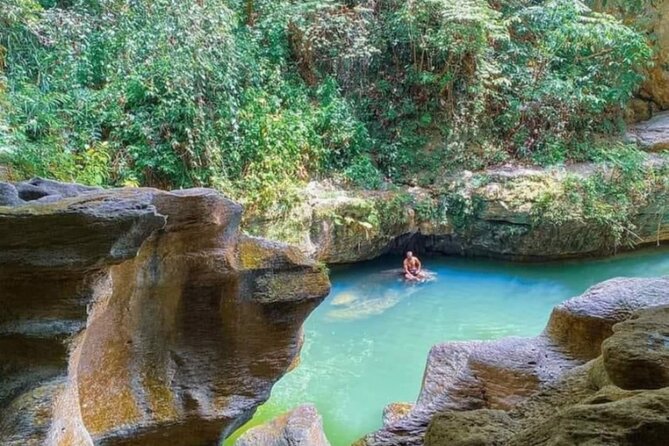 Rainforest Caves and Waterfalls Exploration with Transportation - A rough limestone route, not a paved park trail