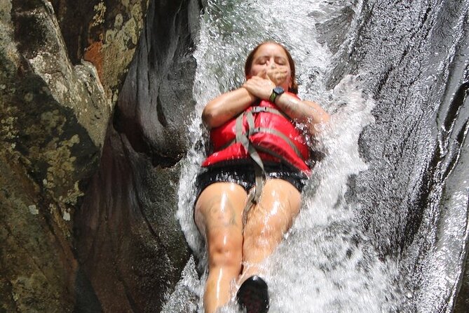 Self-Drive Half-Day Waterslide Yunque Tour - Hiking through El Yunque’s wet forest