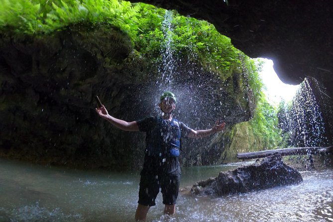 Tanama River Cave Tubing - Entering the caves and muddy tunnels