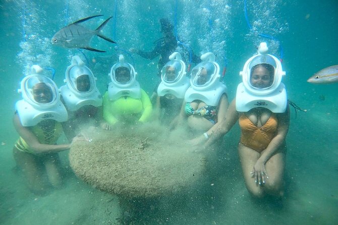 Underwater Sea Trek in San Juan: Explore Beneath the Waves - Putting on the helmet at the Caribe Hilton