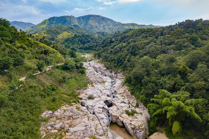 Utuado Canyon, River & Waterfall Adventure in Puerto Rico - A waterfall and canyon shaped by volcanic rock